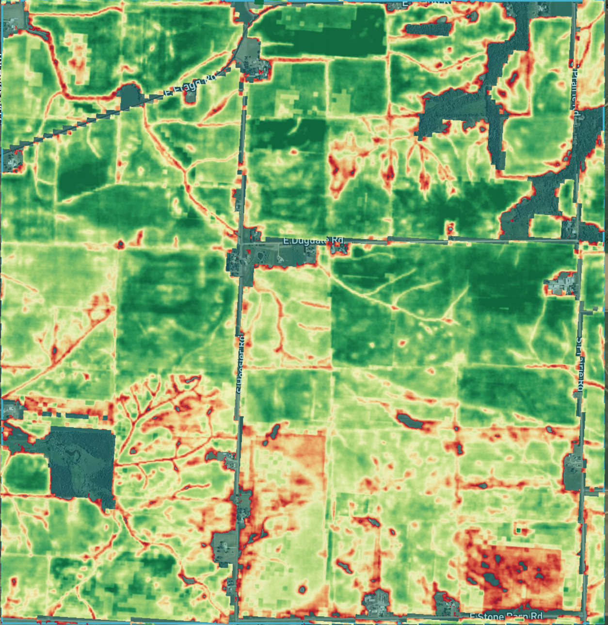 Satellite-derived yield map across several sections of farmland, red through green